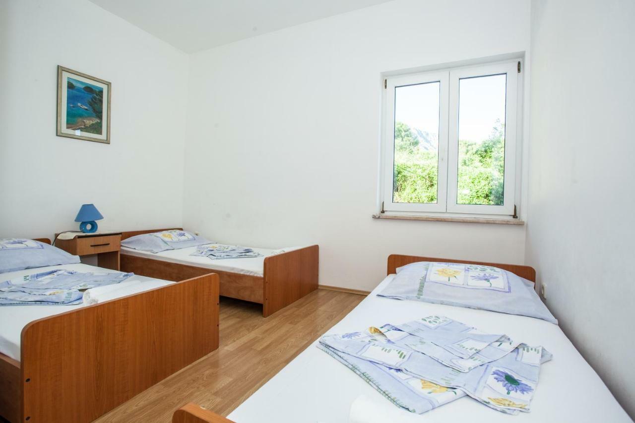Apartments Pusic Омиш Экстерьер фото