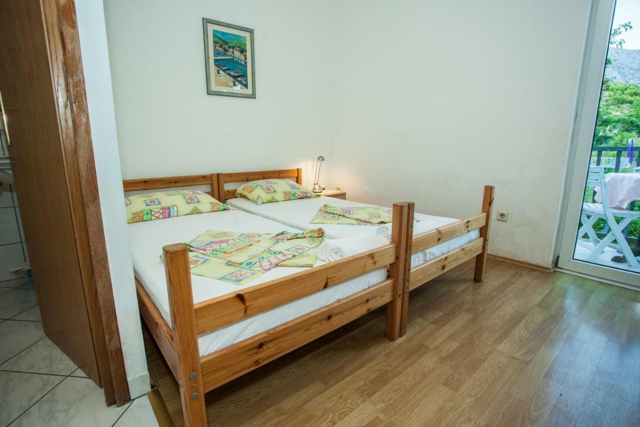 Apartments Pusic Омиш Экстерьер фото